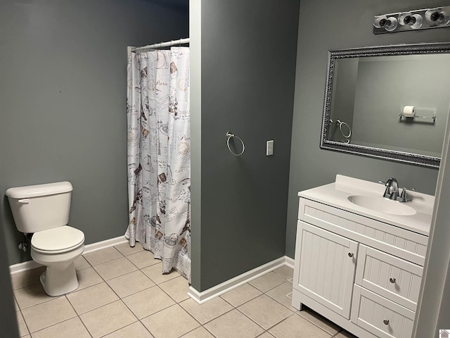 bathroom featuring tile patterned flooring, vanity, a shower with curtain, and toilet