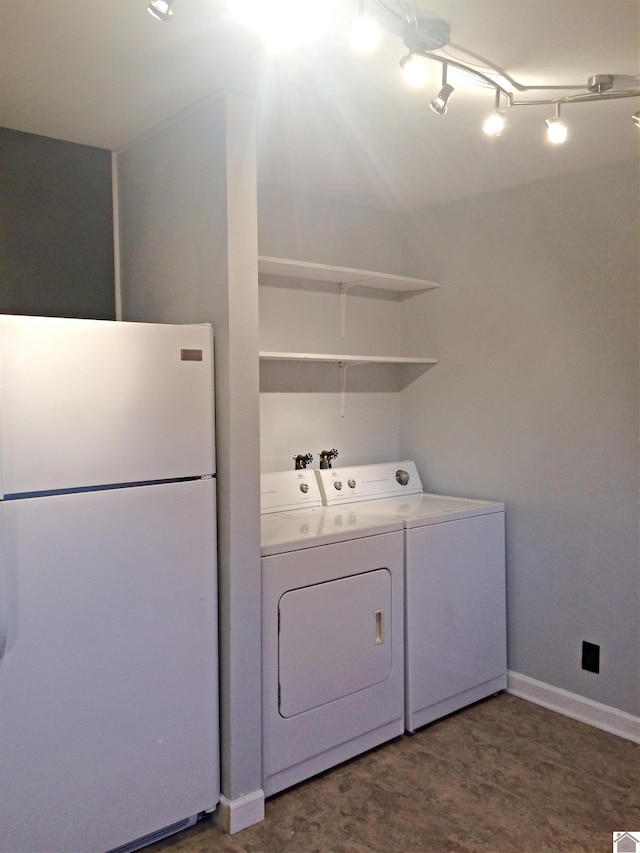 laundry area featuring washing machine and dryer