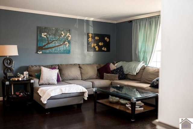 living room with ornamental molding and wood finished floors