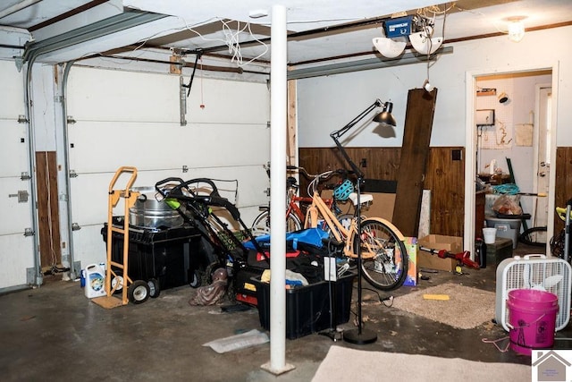 garage with wood walls