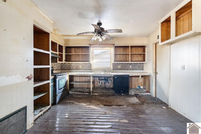 kitchen featuring tasteful backsplash, black dishwasher, sink, stainless steel range with electric stovetop, and ceiling fan