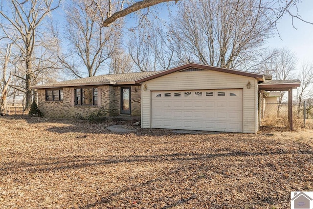 ranch-style home with a garage