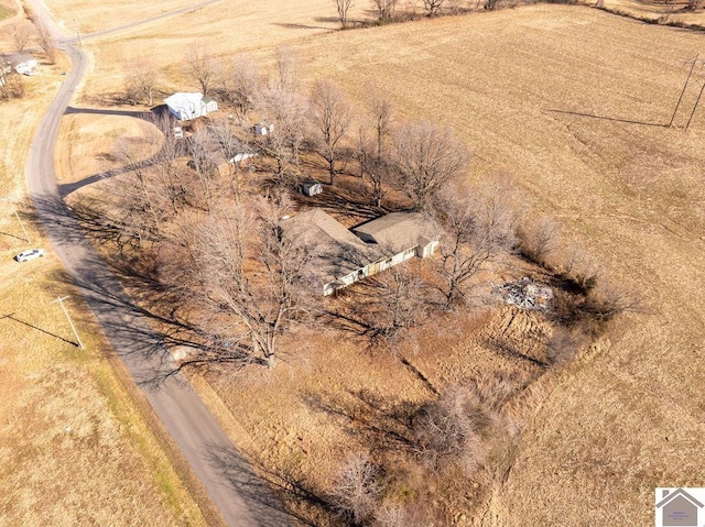 birds eye view of property featuring a rural view