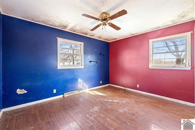 unfurnished room featuring wood-type flooring and ceiling fan