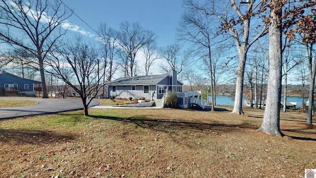 exterior space with a water view