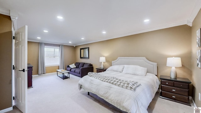 carpeted bedroom featuring crown molding