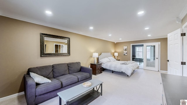 carpeted bedroom featuring ornamental molding and access to outside