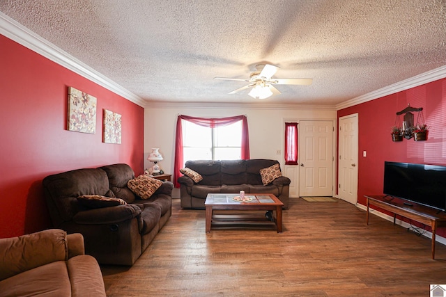 living room featuring hardwood / wood-style floors, crown molding, a textured ceiling, and ceiling fan