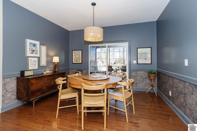 dining room with dark hardwood / wood-style floors