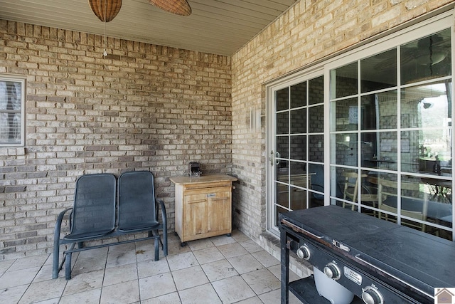 view of patio / terrace featuring ceiling fan