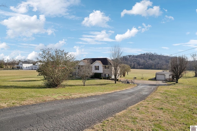 view of road featuring a rural view