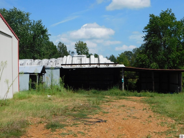 view of yard with a carport