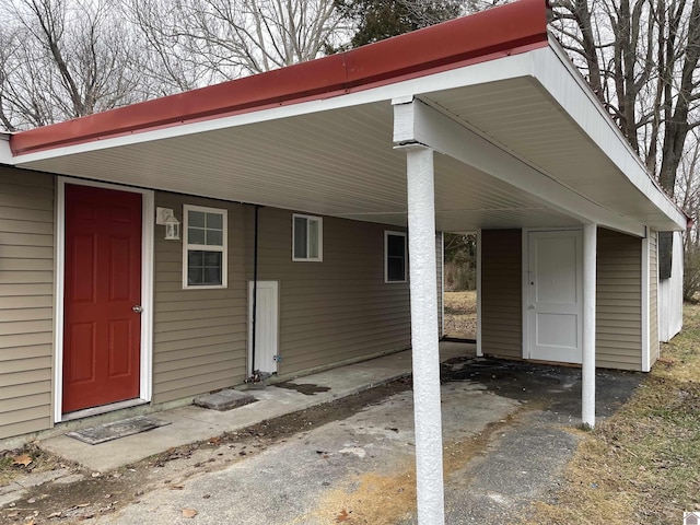 exterior space with a carport