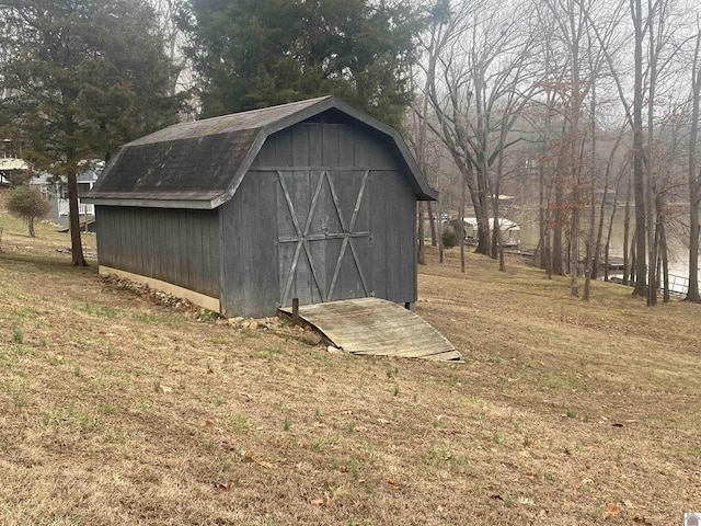 view of outdoor structure with a yard