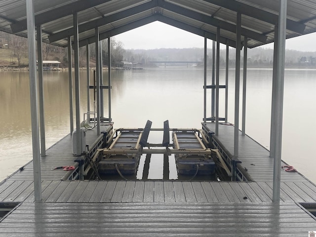 dock area featuring a water view