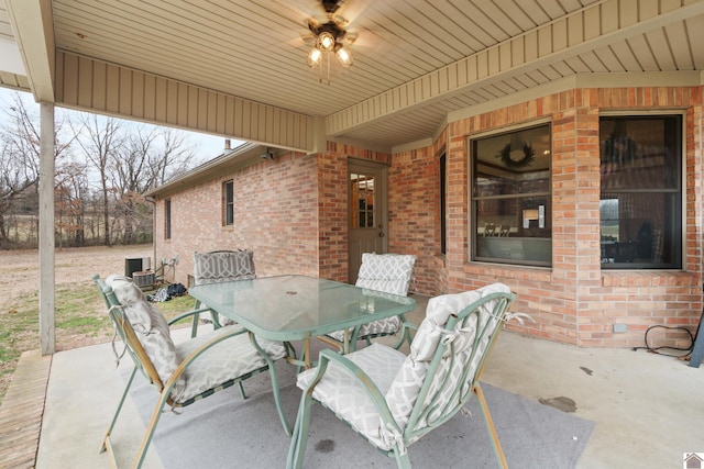 view of patio featuring ceiling fan