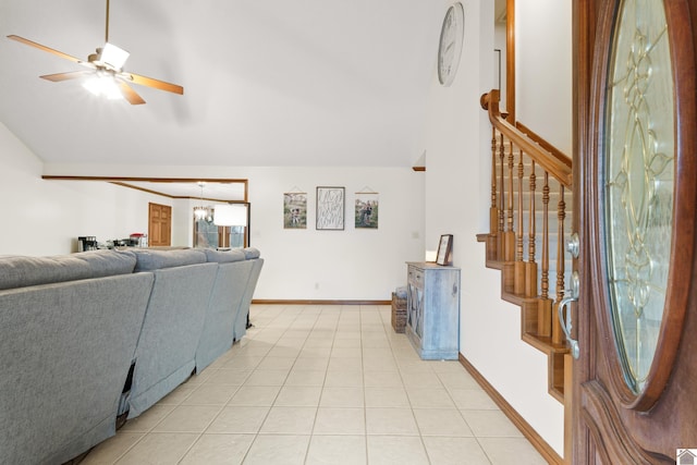 living room with light tile patterned flooring, high vaulted ceiling, and ceiling fan