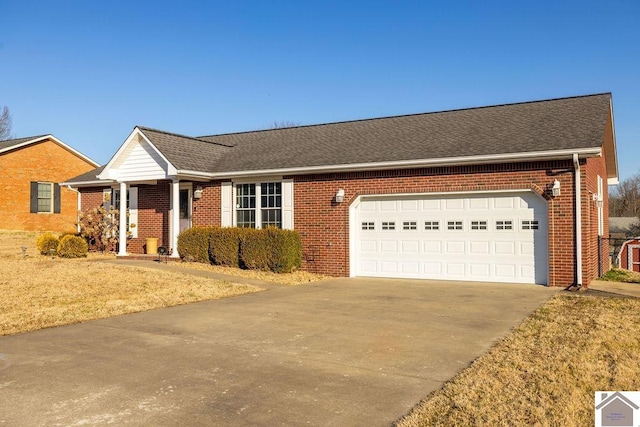 ranch-style house featuring a garage