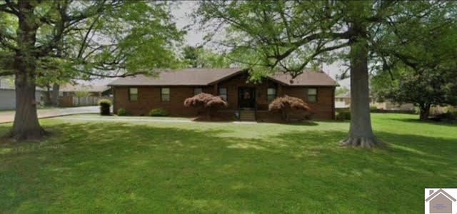 exterior space featuring a front lawn