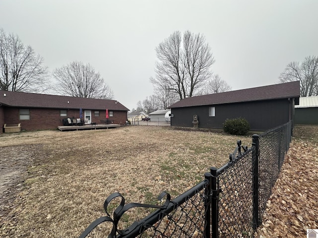 view of yard featuring a deck