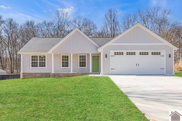 ranch-style home with a garage, a porch, and a front lawn