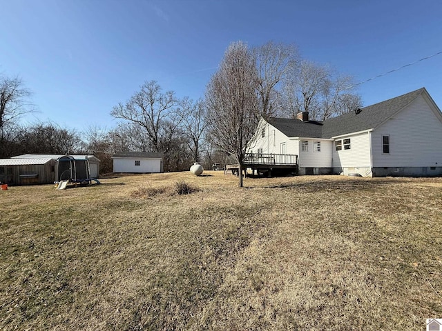 view of yard with a deck