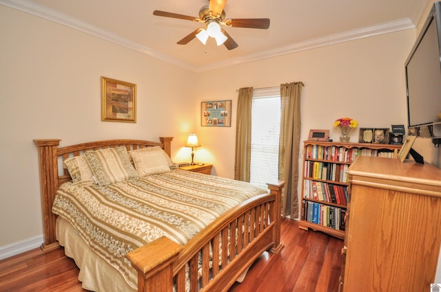 bedroom featuring ceiling fan, ornamental molding, and dark hardwood / wood-style flooring