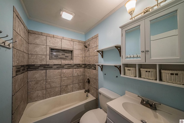 full bathroom featuring tiled shower / bath combo, vanity, crown molding, and toilet