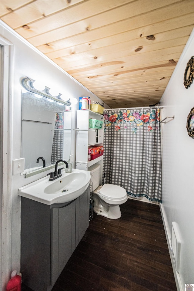 bathroom with toilet, wooden ceiling, vanity, curtained shower, and hardwood / wood-style floors