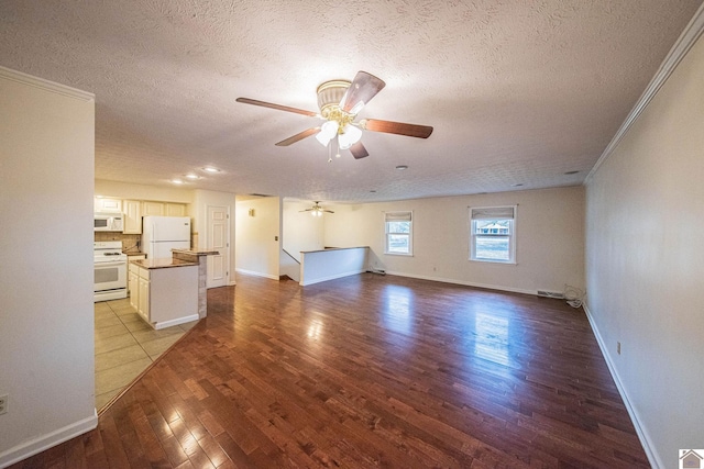 8200 Houser Rd, Boaz, Mccracken, KY 42027 - unfurnished living room featuring crown molding, ceiling fan, a textured ceiling, and light wood-type flooring
