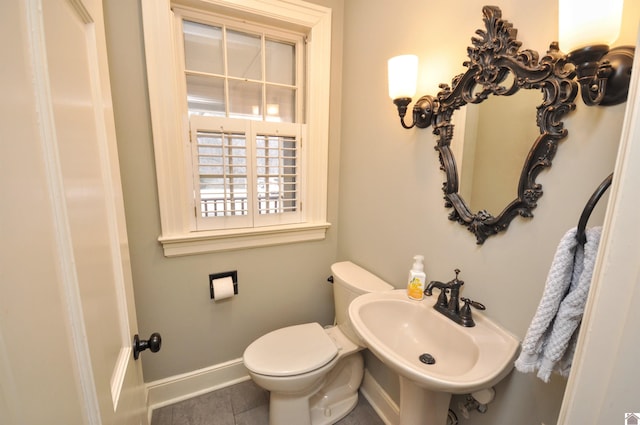 bathroom with sink and toilet