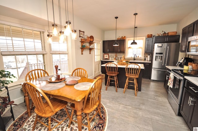 dining room featuring sink