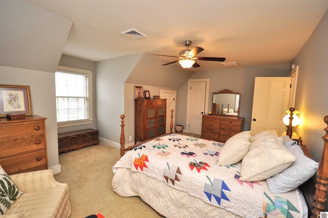 bedroom with lofted ceiling, light carpet, and ceiling fan