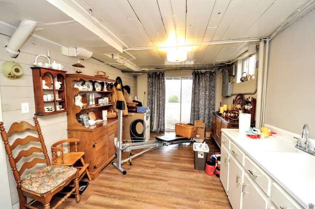 interior space with wood ceiling and light hardwood / wood-style floors