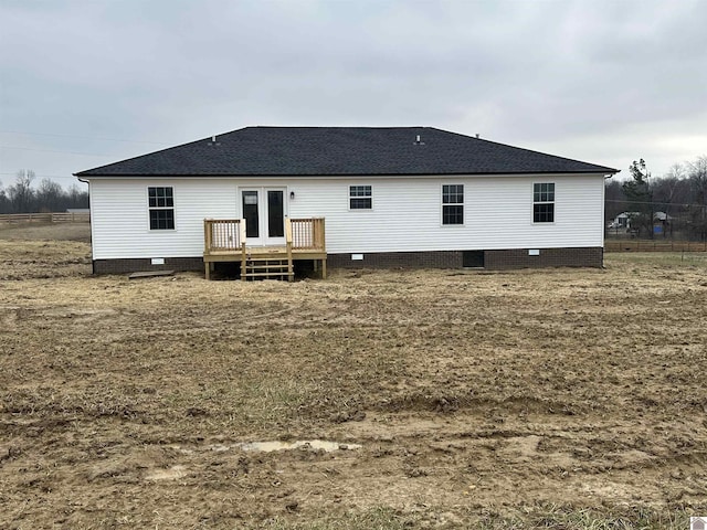 back of property with french doors