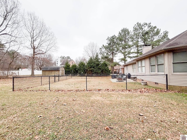 view of yard with a storage shed