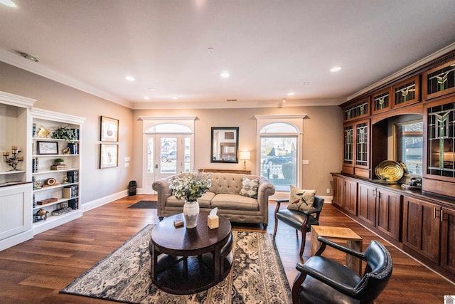 living room with ornamental molding and dark hardwood / wood-style flooring