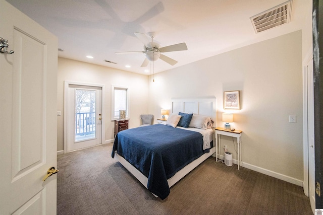 bedroom featuring dark colored carpet, ceiling fan, and access to outside