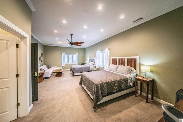 bedroom with crown molding, light colored carpet, and ceiling fan