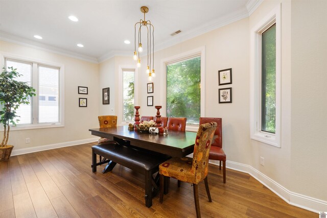 502 N 5th St, Paducah, KY 42001 - dining room with wood finished floors, baseboards, ornamental molding, and recessed lighting