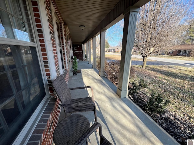 view of patio featuring a porch