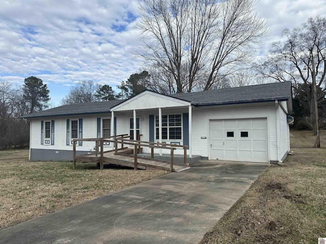 ranch-style home with a garage, a front lawn, and covered porch