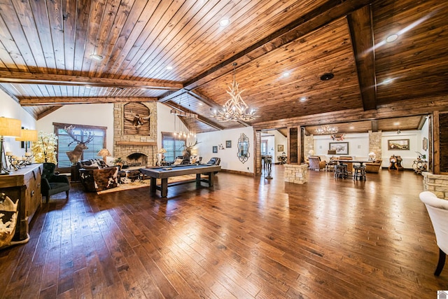 recreation room featuring a fireplace, wood-type flooring, a chandelier, wood ceiling, and beam ceiling