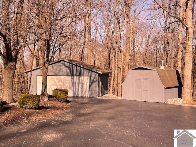 exterior space with an outbuilding