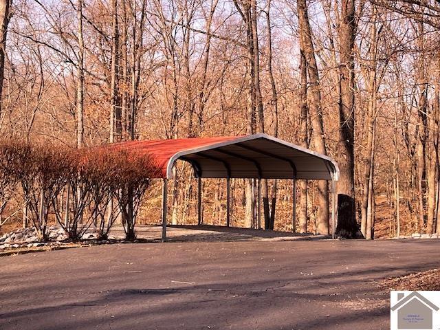 view of parking with a carport