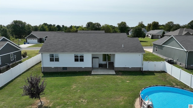 2206 Traci Dr, Murray, KY 42071 - back of house with a fenced backyard, crawl space, a patio, and a shingled roof
