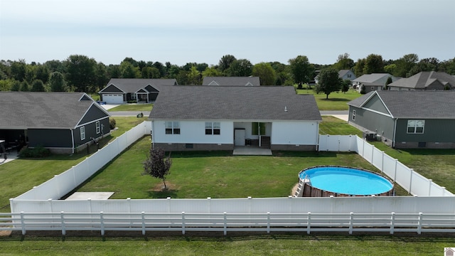 2206 Traci Dr, Murray, KY 42071 - back of property featuring a fenced in pool, a fenced backyard, a yard, a residential view, and crawl space