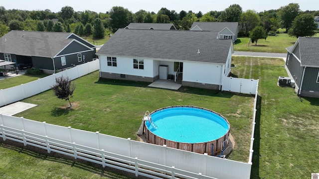 2206 Traci Dr, Murray, KY 42071 - back of property featuring crawl space, a fenced backyard, a yard, a patio, and a fenced in pool