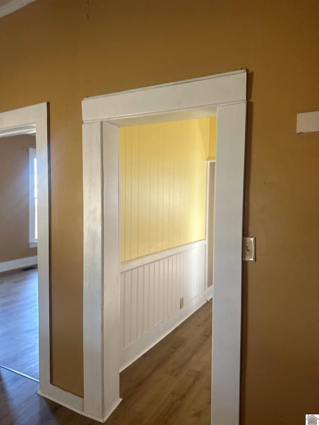 hallway with dark wood-type flooring