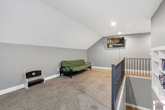 carpeted bedroom featuring vaulted ceiling